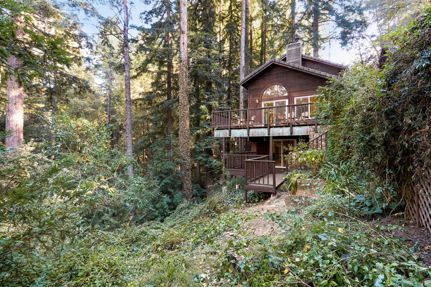 170 Swett Road Woodside, CA 94062 - Photo 35 of 36 a view of a house with a yard and tree s