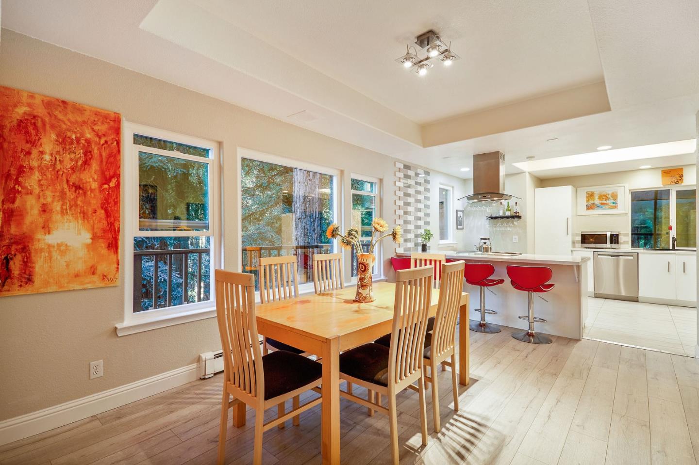 170 Swett Road Woodside, CA 94062 - Photo 8 of 36 a view of a dining room with furniture window and wooden floor