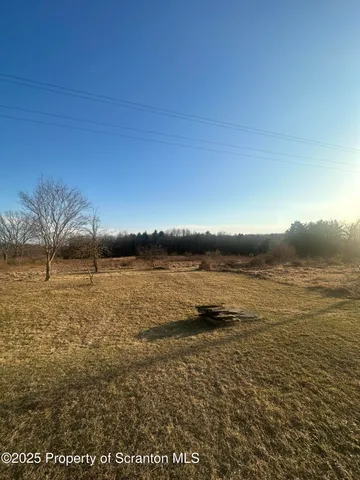 a view of outdoor space and yard