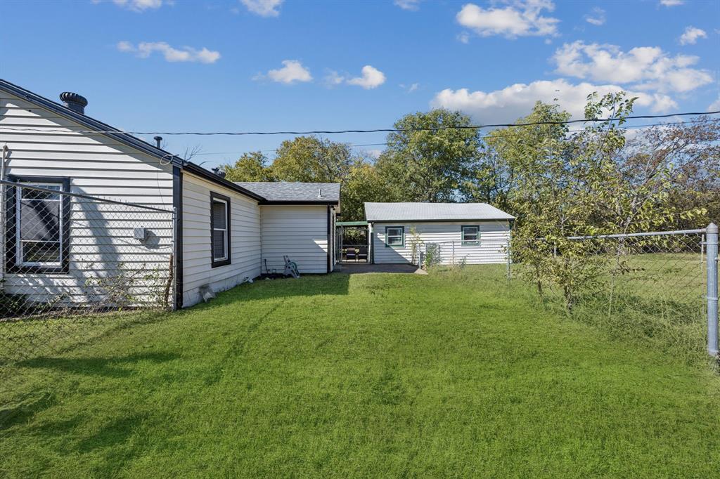 5621 Bonnie Drive Watauga, TX 76148 - Photo 29 of 40 a view of a house with a yard