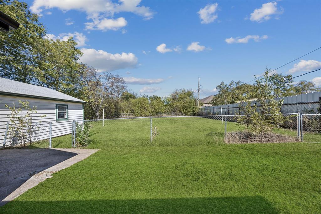 5621 Bonnie Drive Watauga, TX 76148 - Photo 30 of 40 a view of a house with a yard