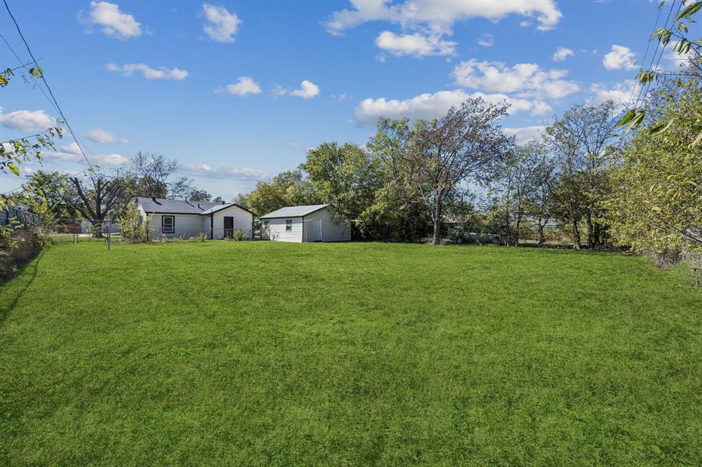 5621 Bonnie Drive Watauga, TX 76148 - Photo 31 of 40 a view of a field of grass and trees