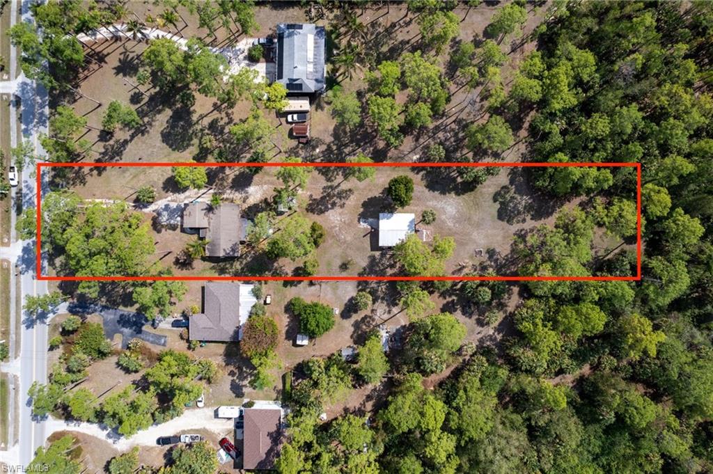 465 5th Street Southwest Naples, FL 34117 - Photo 1 of 33 Aerial view of property's location with property parcel outlined