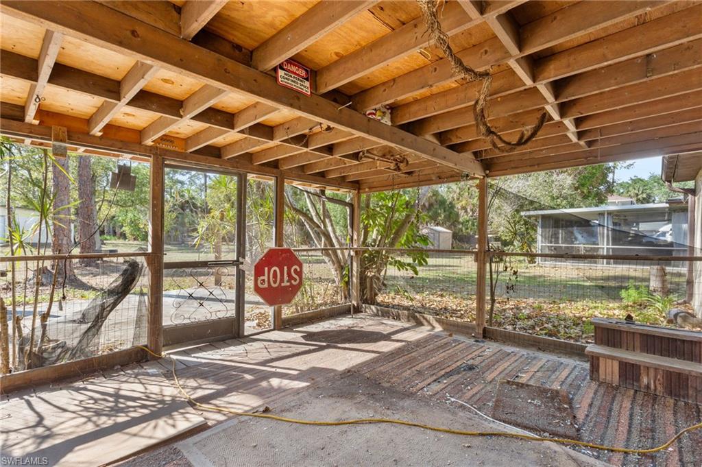 465 5th Street Southwest Naples, FL 34117 - Photo 32 of 33 View of unfurnished sunroom