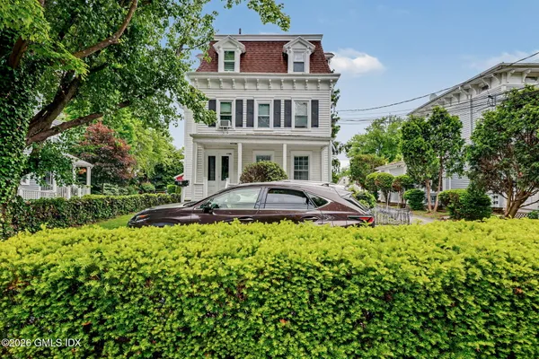 a view of a house with a garden