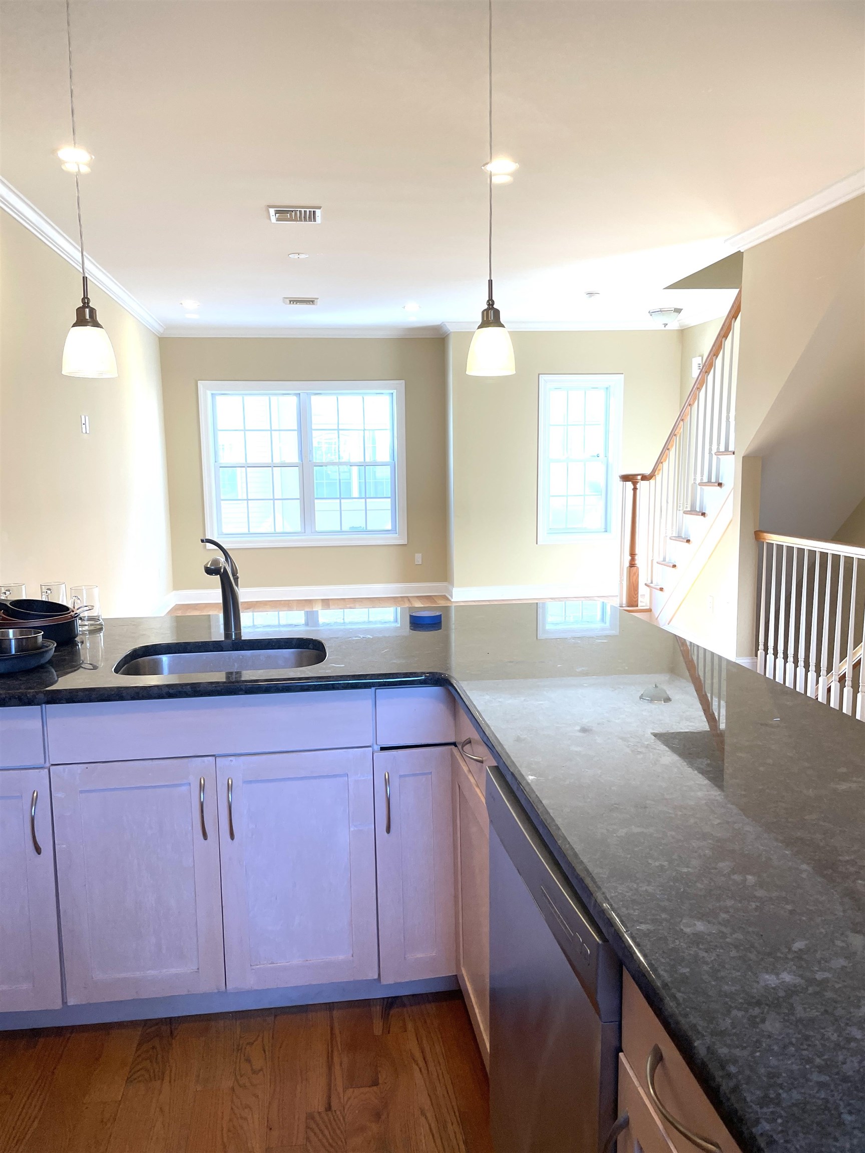734 County Avenue, Unit B2 Secaucus, NJ 07094 - Photo 8 of 19 a kitchen with a sink a counter space appliances and cabinets