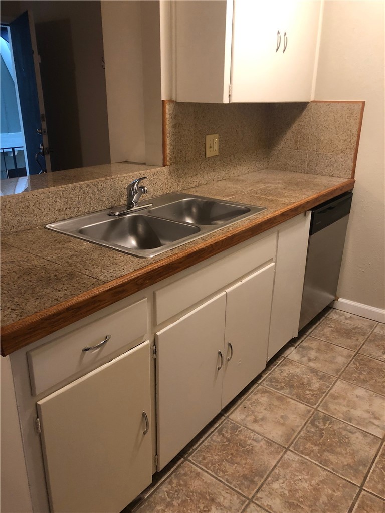 4306 Avenue A, Unit 109 Austin, TX 78751 - Photo 5 of 13 a close view of sink and tap