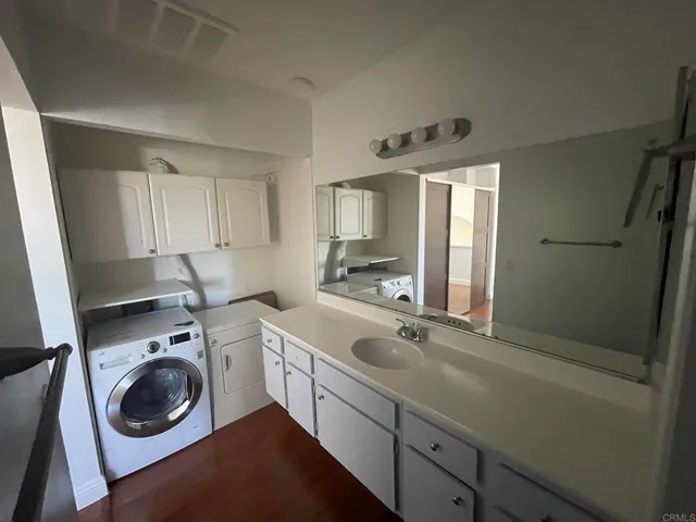 a bathroom with a shower and a toilet