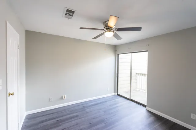a bathroom with a sink toilet and mirror