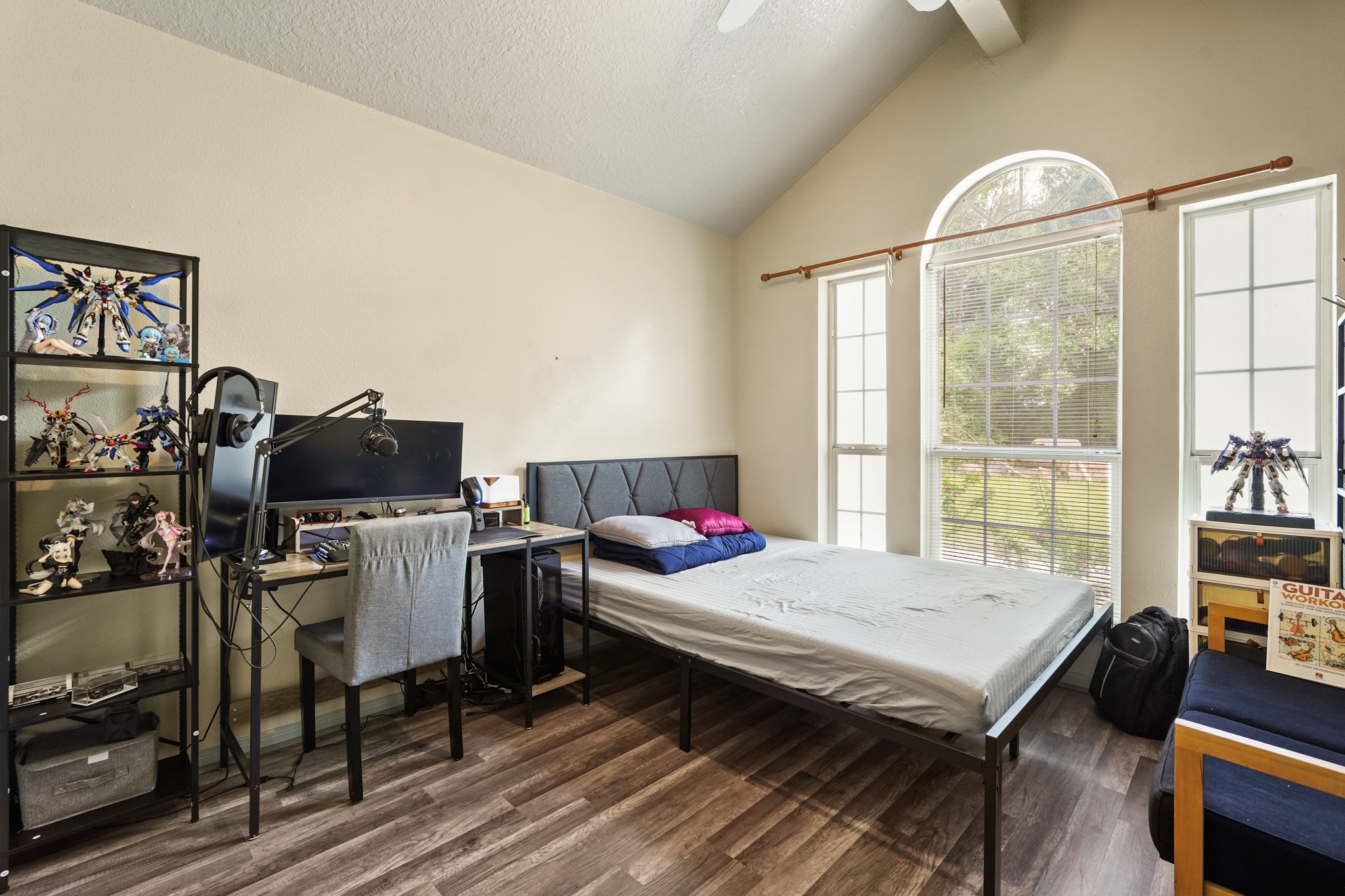 14616 Grant Road Cypress, TX 77429 - Photo 11 of 18 a bedroom with furniture and a window