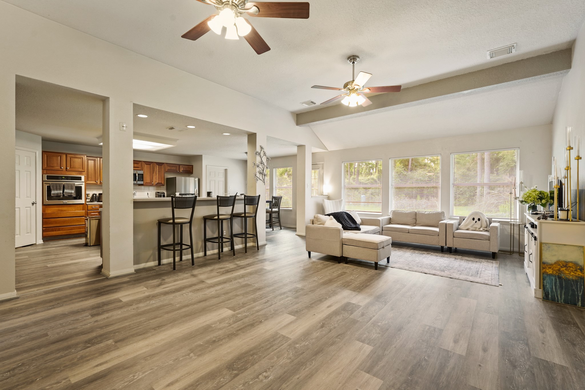 14616 Grant Road Cypress, TX 77429 - Photo 5 of 18 a living room with furniture and a large window