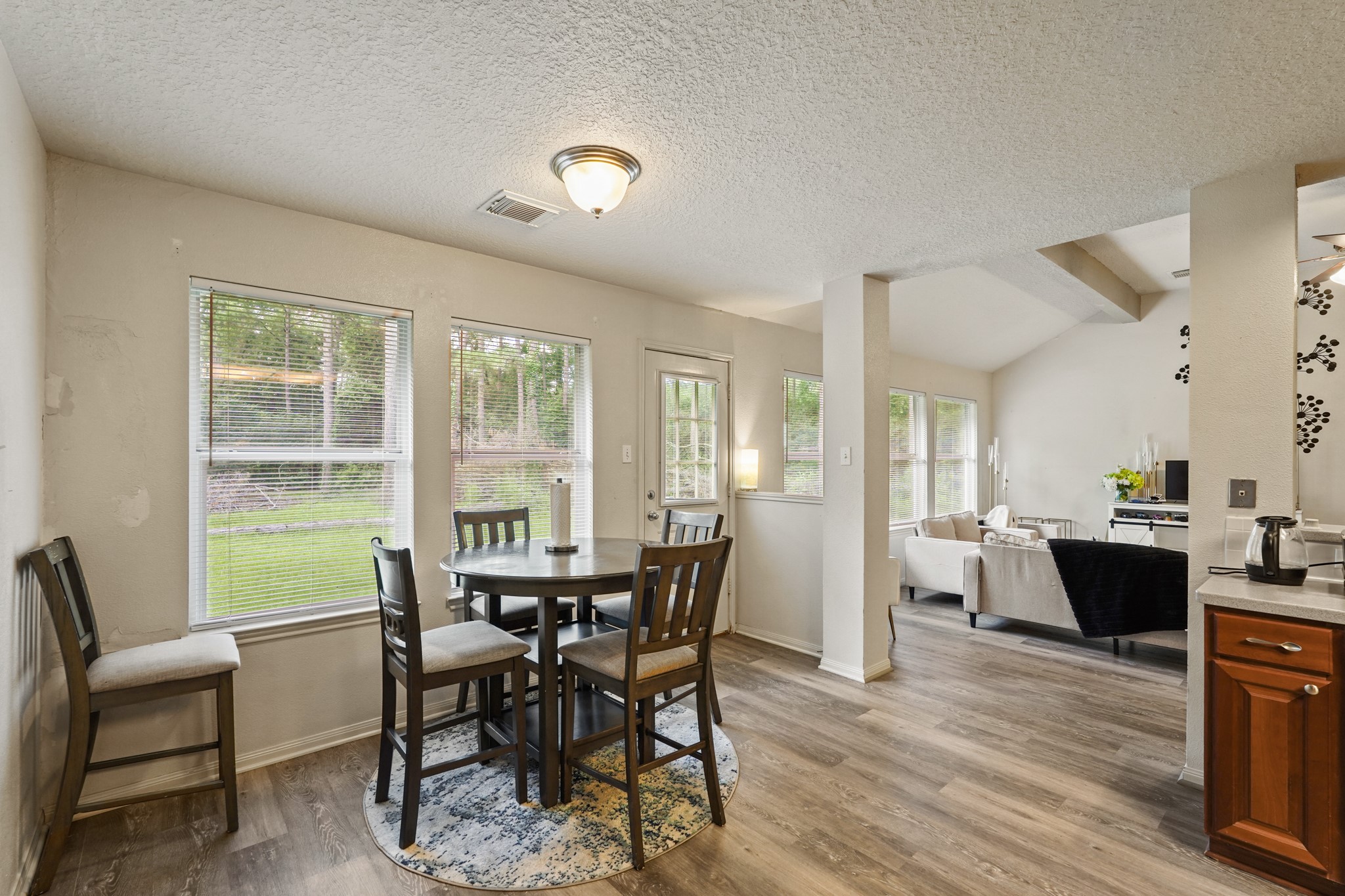 14616 Grant Road Cypress, TX 77429 - Photo 8 of 18 a view of a dining room with furniture window and wooden floor