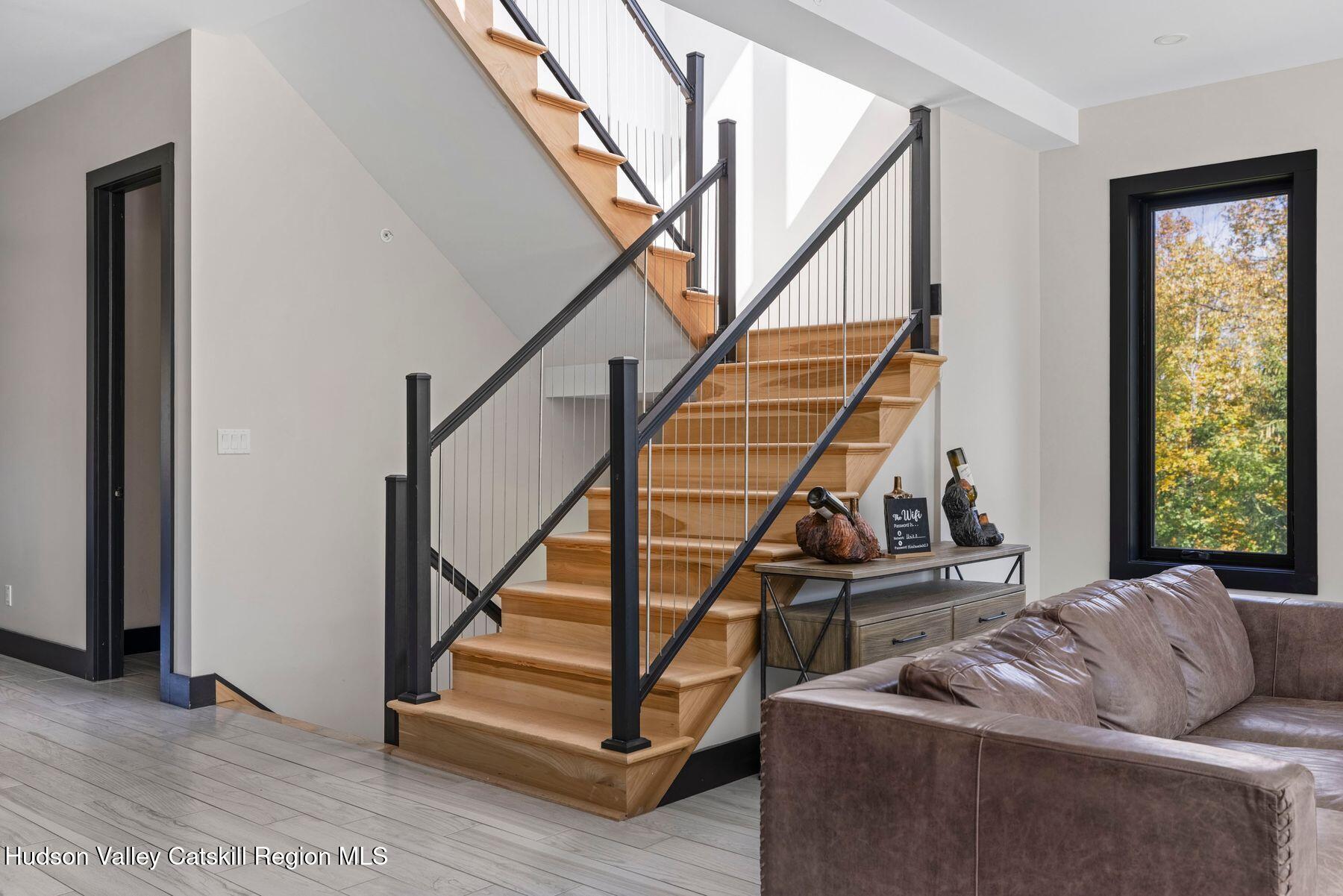 3 South Street Windham, NY 12496 - Photo 13 of 61 a living room with furniture and a hard wood floor