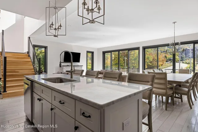 a dining room with furniture window wooden floor