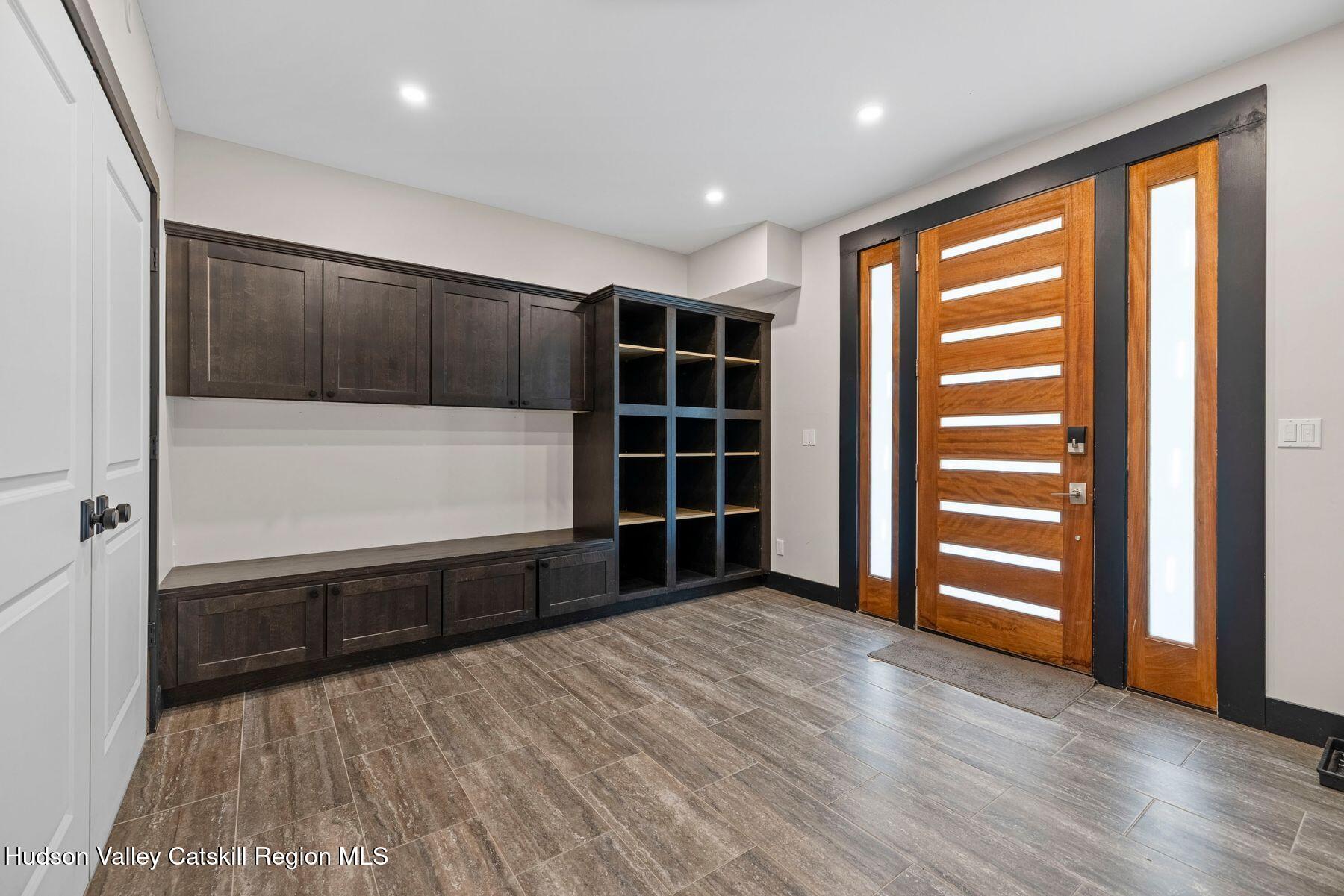 3 South Street Windham, NY 12496 - Photo 3 of 61 an empty room with wooden floor and windows