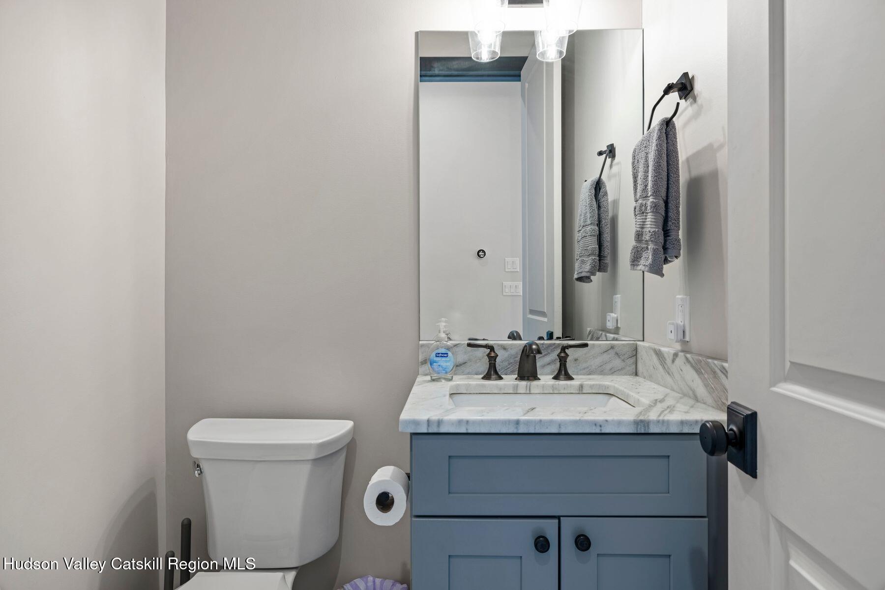 3 South Street Windham, NY 12496 - Photo 46 of 61 a bathroom with a sink and a toilet