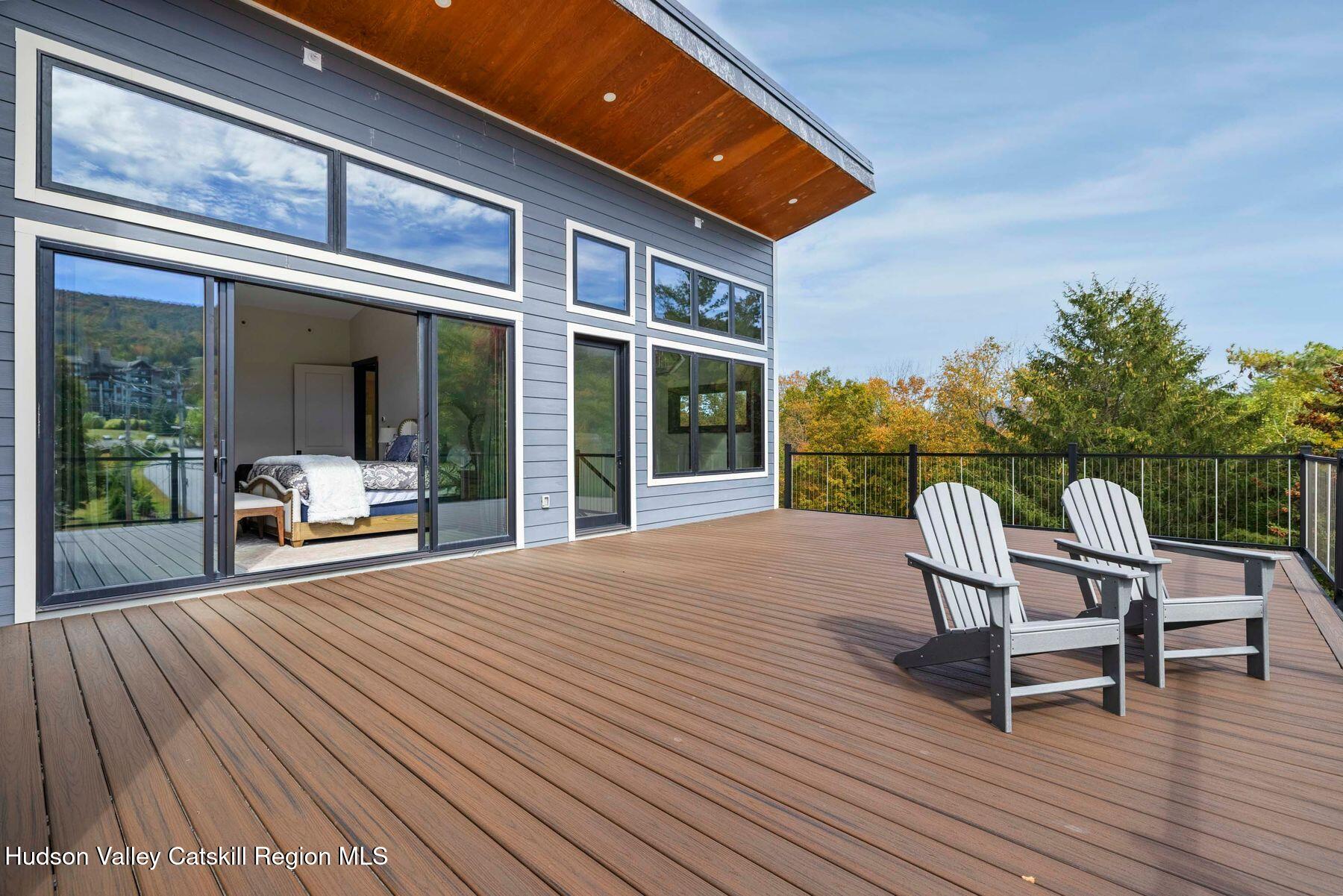 3 South Street Windham, NY 12496 - Photo 53 of 61 a view of a chair and tables in the balcony