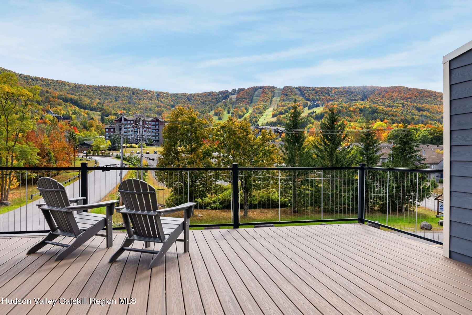 3 South Street Windham, NY 12496 - Photo 54 of 61 a view of balcony with furniture and wooden floor