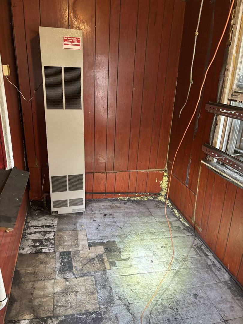 6331 South Winchester Avenue Chicago, IL 60636 - Photo 8 of 30 a view of an empty room with wooden floor and stairs