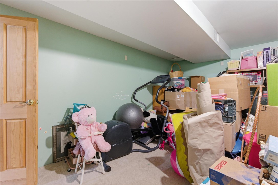 8747 Waynes Way Blanchester, OH 45107 - Photo 24 of 40 This versatile basement space offers abundant storage potential for various needs.