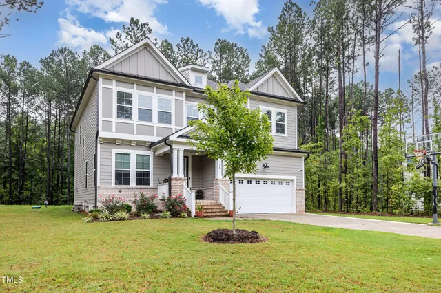 a house with garden in front of it