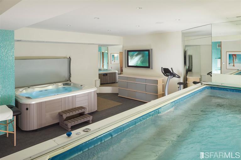 2330 Lyon Street San Francisco, CA 94115 - Photo 22 of 27 Gym/Spa Room: This large spa room & gym has a full bathroom with steam shower. There’s ample room for gym equipment and several machines. There’s a built-in swim spa (endless pool) that is heated and can provide swimming resistance up to Olympic level.In addition there is a large hot Aqua Spa that is separate for soaking and relaxing. There’s a large LCD TV in the spa room, and a smaller LCD screen in the bathroom. It is fully air-conditioned.