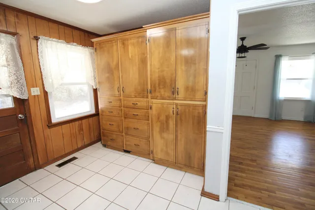 a view of a closet area with entryway