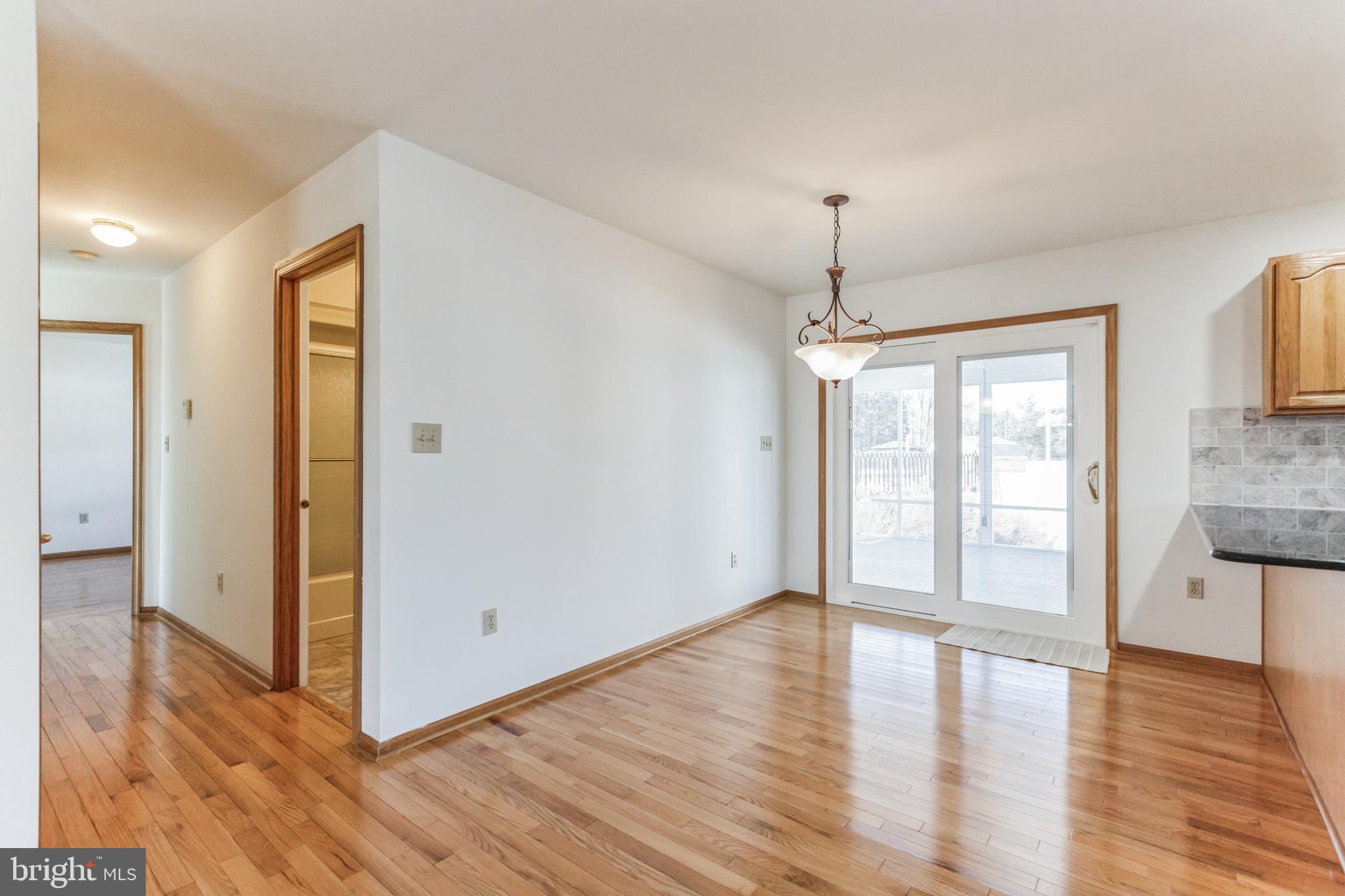 1928 Almond Road Vineland, NJ 08360 - Photo 11 of 30 Dining Area and Sliding Doors