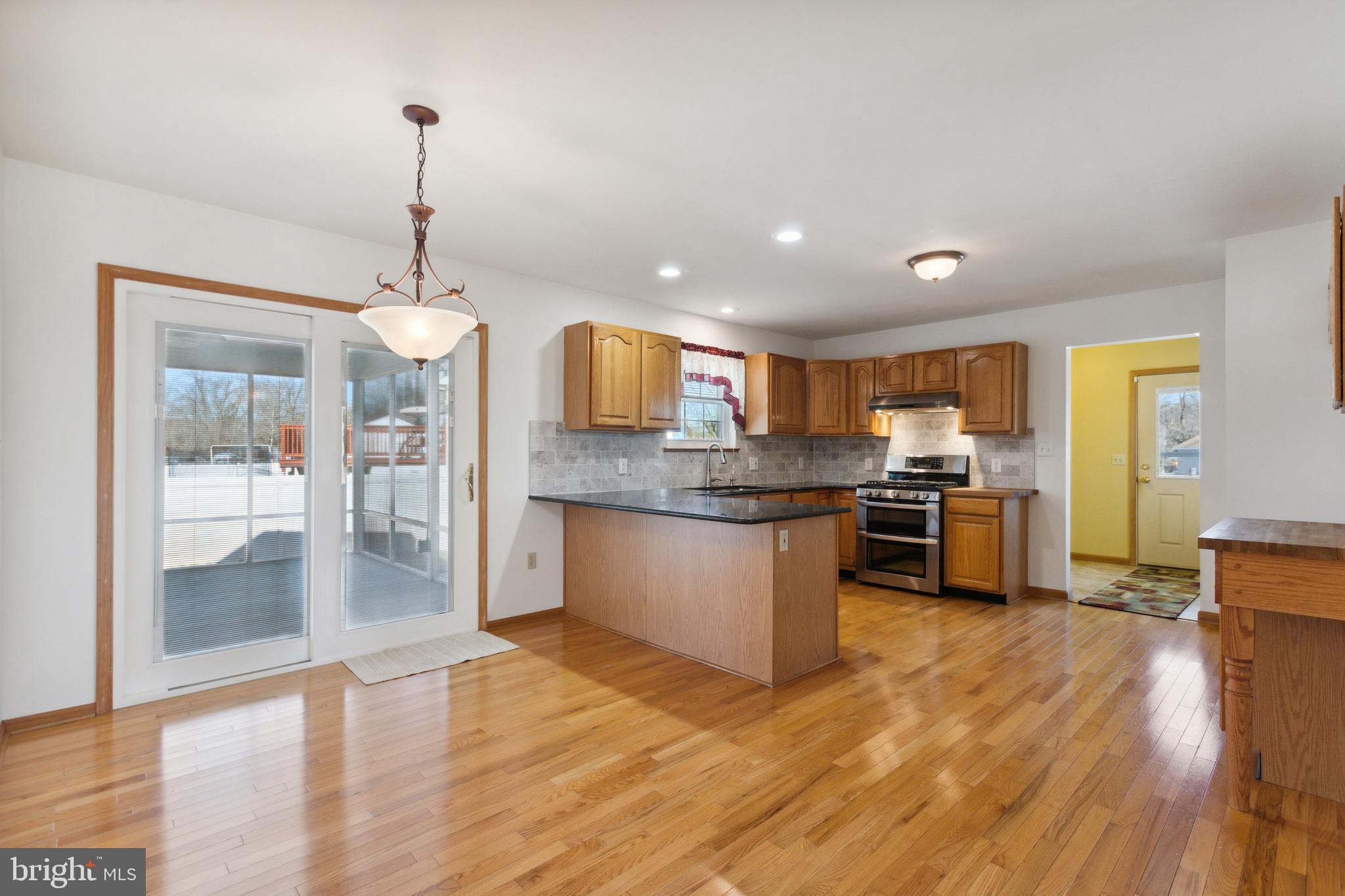 1928 Almond Road Vineland, NJ 08360 - Photo 6 of 30 Open Dining Room to Kitchen