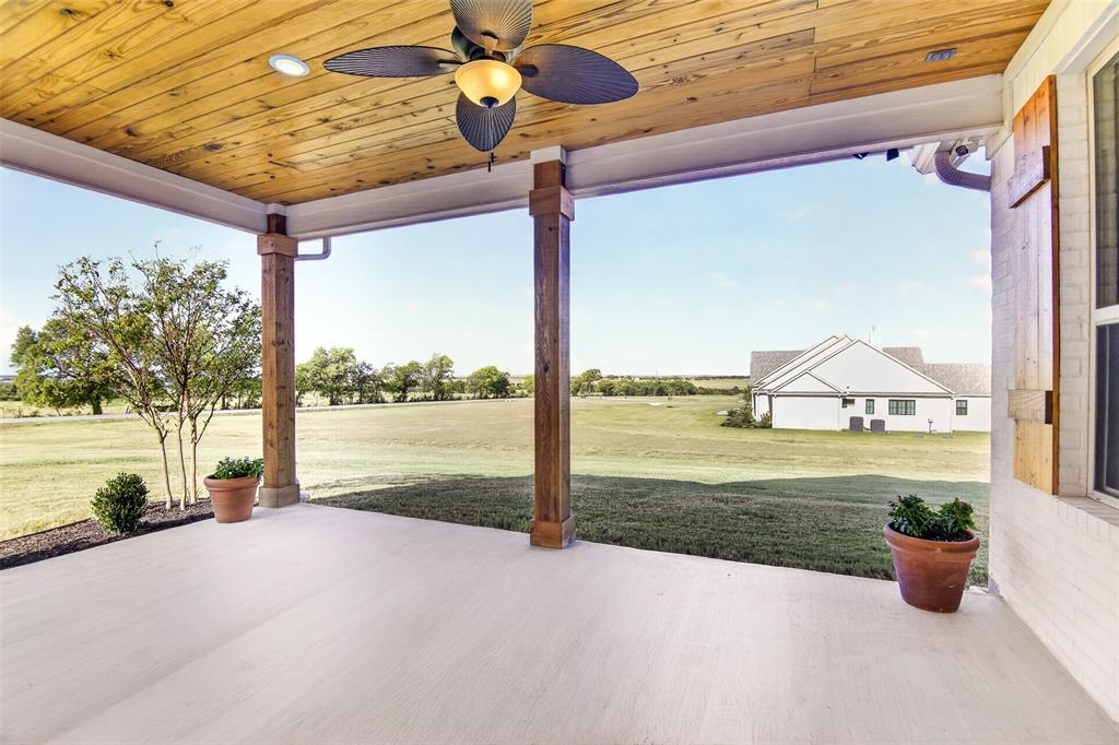 10828 Gregory Road Sanger, TX 76266 - Photo 8 of 37 Covered patio featuring a wood-paneled ceiling, ceiling fan, recessed lighting, and timber columns