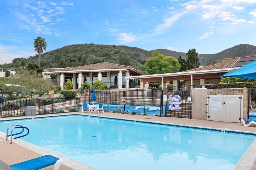 7467 Mission Gorge Road, Unit SPC 10 Santee, CA 92071 - Photo 41 of 44 a view of a swimming pool with a deck