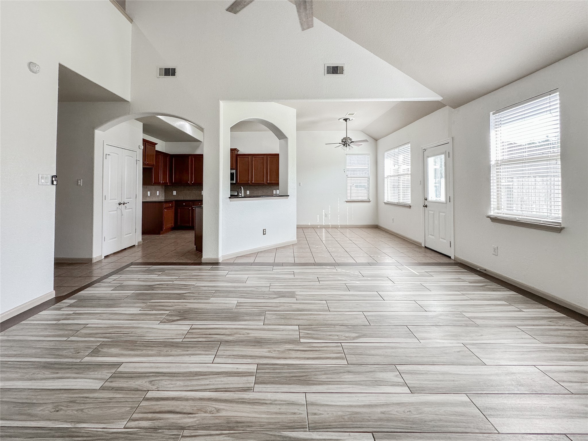 20319 Little Wing Drive Spring, TX 77388 - Photo 20 of 49 a view of empty room with windows and fireplace