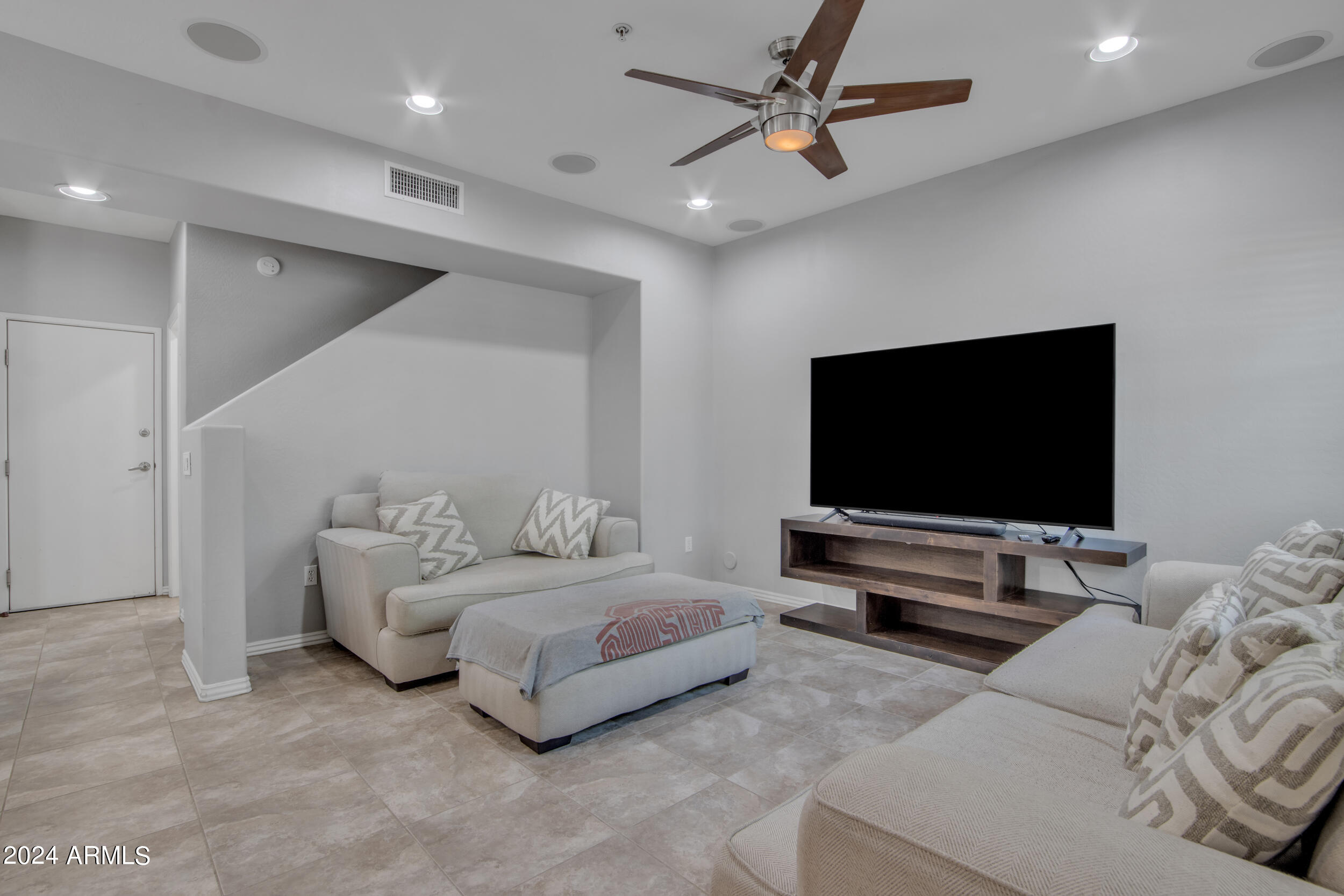 3935 East Rough Rider Road, Unit 1233 Phoenix, AZ 85050 - Photo 13 of 32 Living Room