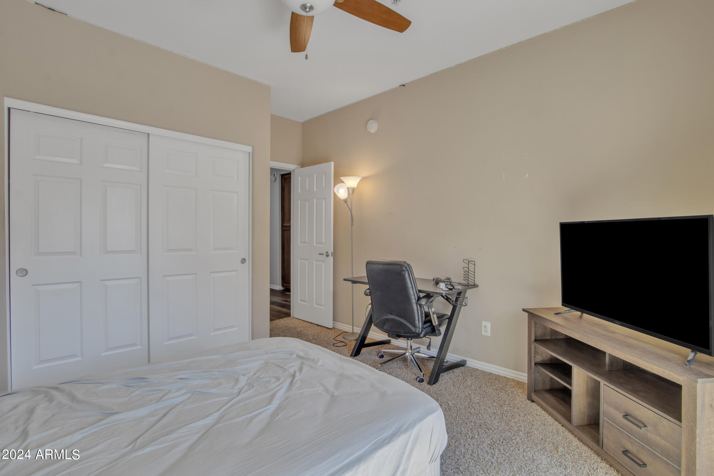 3935 East Rough Rider Road, Unit 1233 Phoenix, AZ 85050 - Photo 26 of 32 Bedroom 2