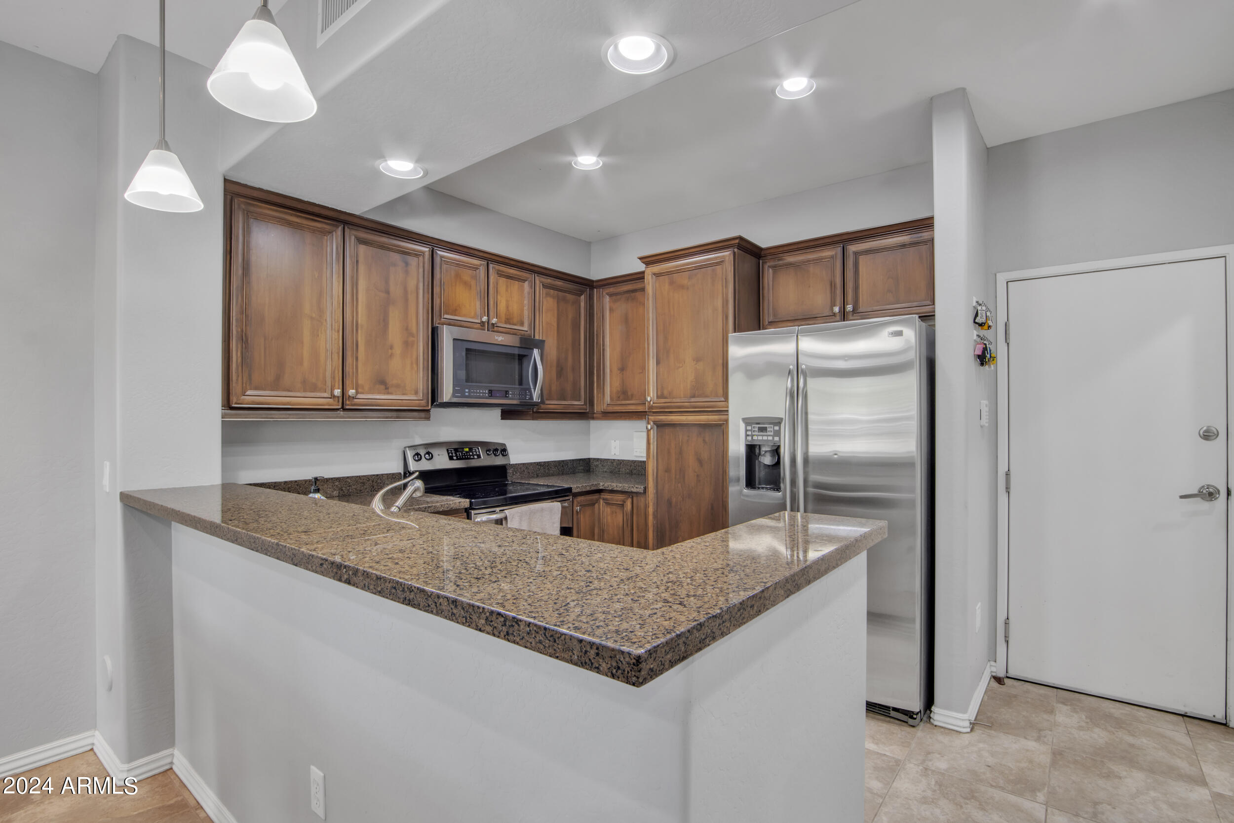 3935 East Rough Rider Road, Unit 1233 Phoenix, AZ 85050 - Photo 7 of 32 Kitchen