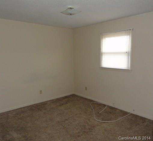 562 Sharon School Road, Unit 3 Statesville, NC 28625 - Photo 4 of 6 an empty room with a window