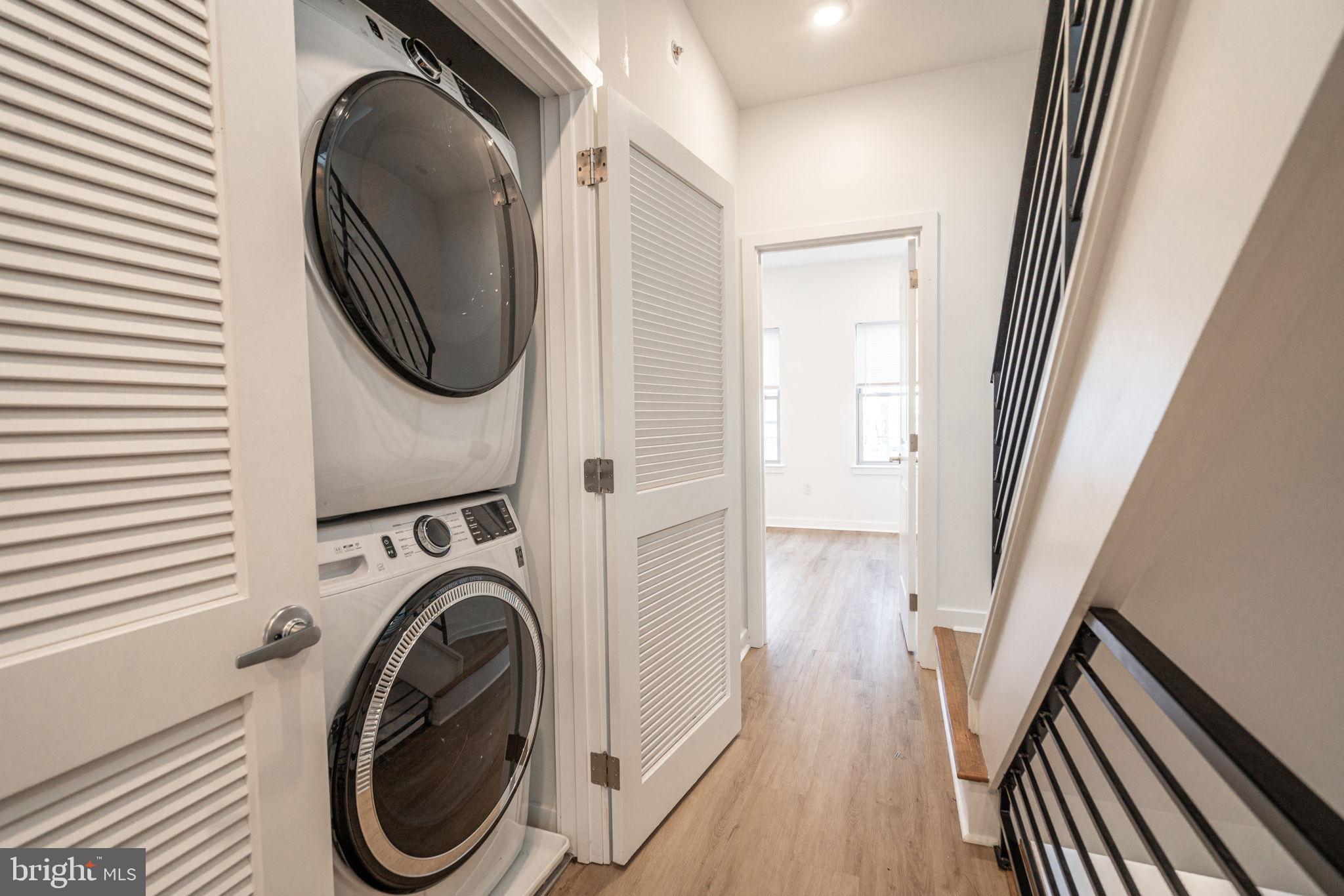 1105 South 27th Street Philadelphia, PA 19146 - Photo 13 of 19 a view of a hallway with washer and dryer