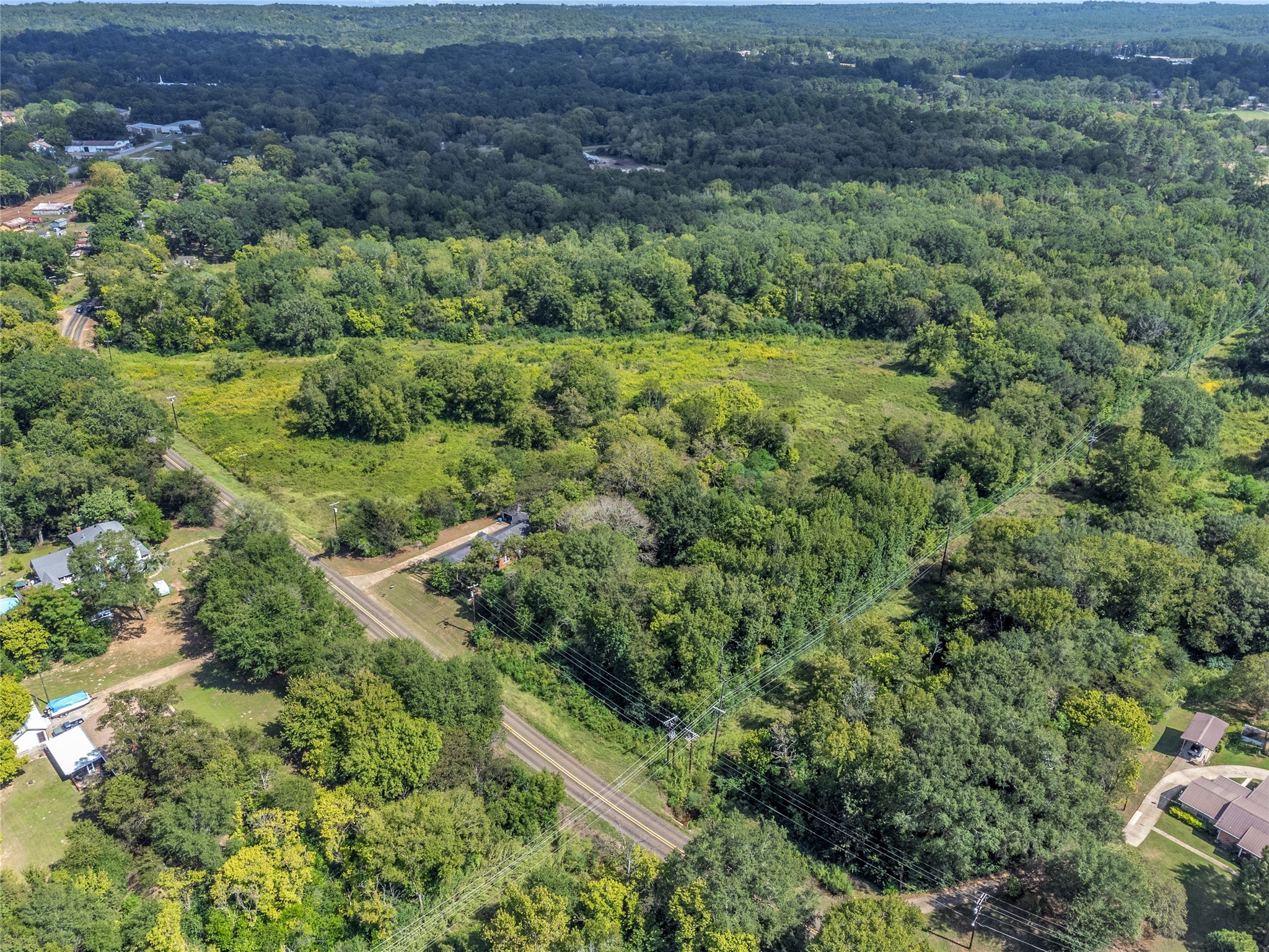 Tbd Crockett Street Rusk, TX 75785 - Photo 5 of 17 a view of a lush green forest with trees and houses
