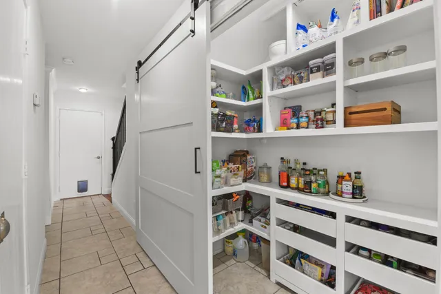 a room with storage and utility