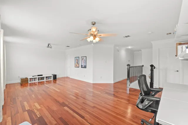 a bedroom with furniture and a chandelier