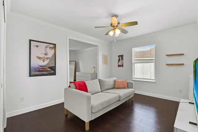 a living room with furniture and window