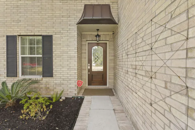 a front view of a house with a shower