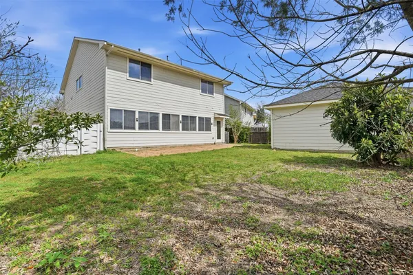 a house view with a garden space