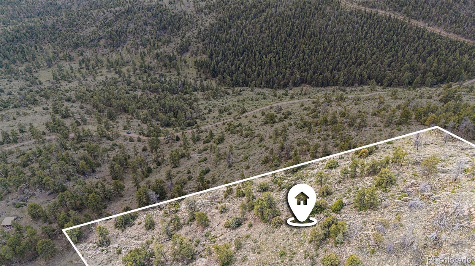 14336 South Wamblee Trail Conifer, CO 80433 - Photo 7 of 12 a view of roof and mountain