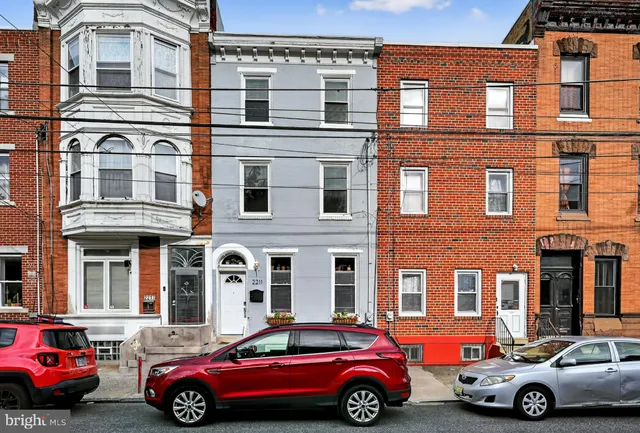 a cars parked in front of a building