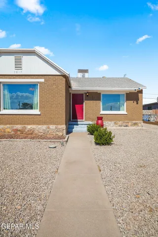 a house view with a backyard space