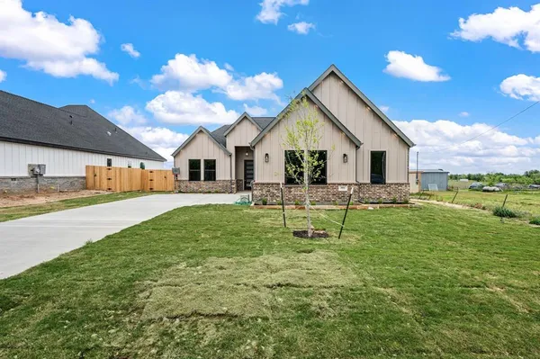 a house view with swimming pool and porch