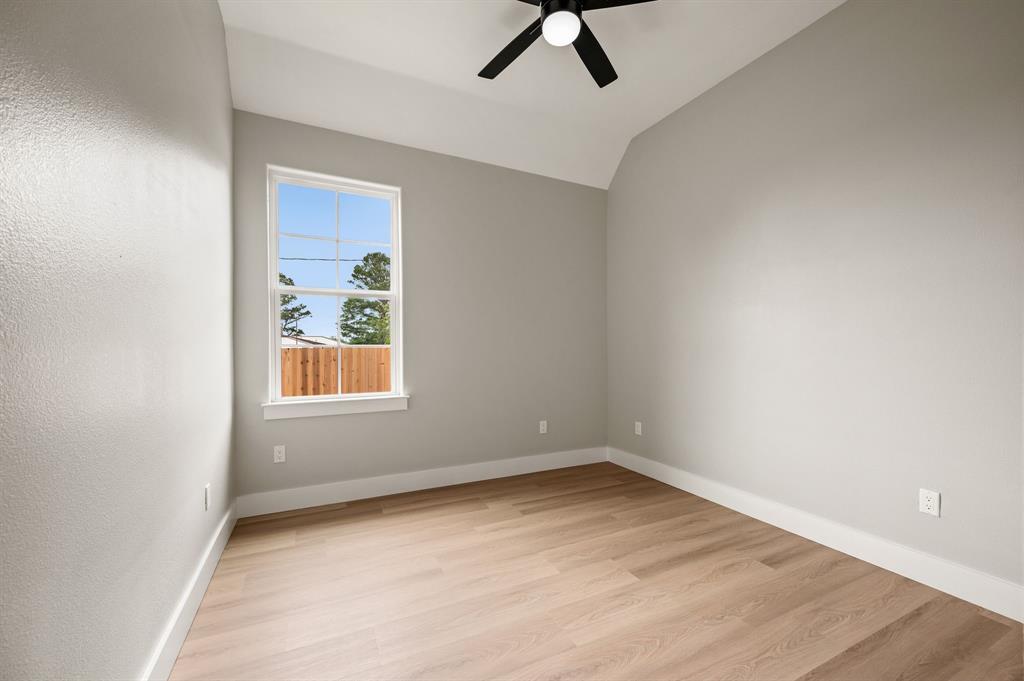 806 N Avenue East Springtown, TX 76082 - Photo 17 of 25 an empty room with a window