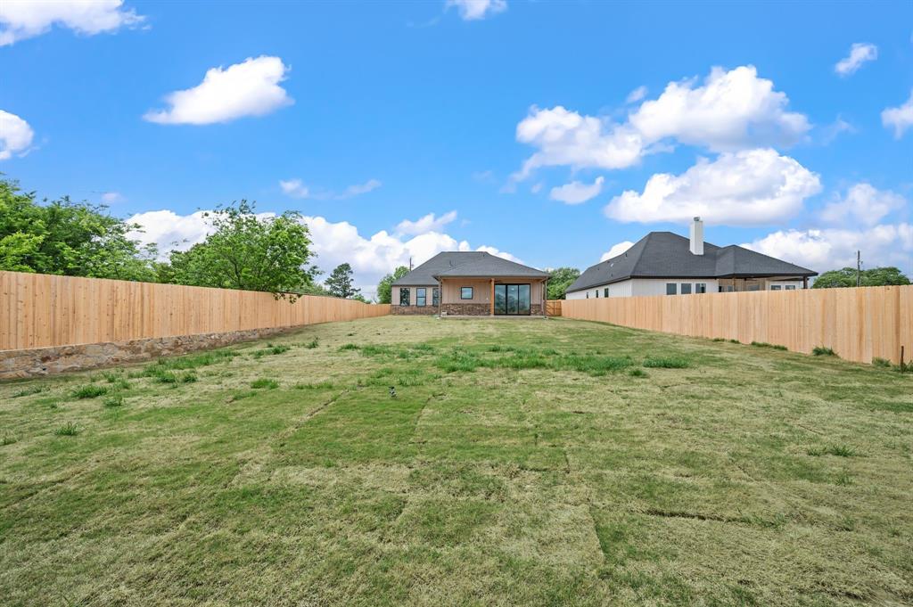 806 N Avenue East Springtown, TX 76082 - Photo 24 of 25 a view of an outdoor space and a yard