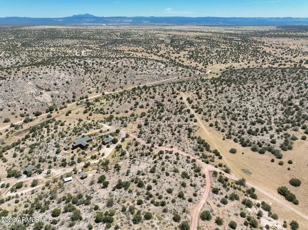 a view of beach and an ocean